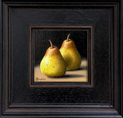 This beautiful Anne Songhurst, original oil painting is exhibited at Norton Way Gallery. It depicts two beautiful ripe, Rocha pears, in a simple composition and is typical of an Anne Songhurst realist painting. It is exhibited at Norton Way Gallery Hertfordshire. It is framed in a rich and broad dark wooden frame.
