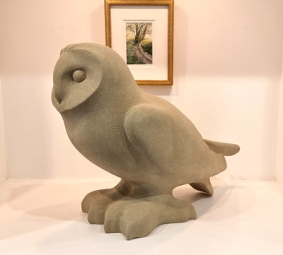 Jennifer Tetlow sculpture at Norton Way Gallery Hertfordshire. This beautiful stone carving, from Jennifer Tetlow is carved from Yourkstone. It depicts a symbolic Short Eared owl.