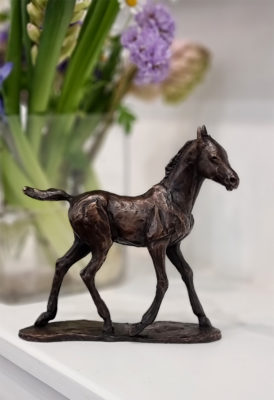 Foundry Bronze by Deborah Burt at Norton Way Gallery, Hertfordshire. Deborah Burt creats beautiful small to medium sized animal sculptures in foundry bronze. This pieces depicts a delightful young foal.