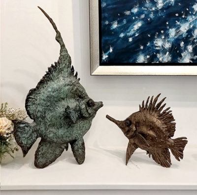 Andrzej Szymczyk sculpture at Norton Way Gallery Hertfordshire. This beautiful marine sculpture is created in foundry bronze by artist Andrzej Szymczyk. It depicts a powerful freestanding fish in a traditional bronze patina. Also shown in a Sea Angel Fish by Andrzej Szymczyk, too.