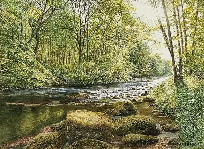 Rosalind Pierson art at Norton Way Gallery Hertfordshire. This beautiful, miniature, painting has been painted in watercolour. It is an original artwork from Rosalind Pierson and depicts a shaded summer river. There are trees and bolders..