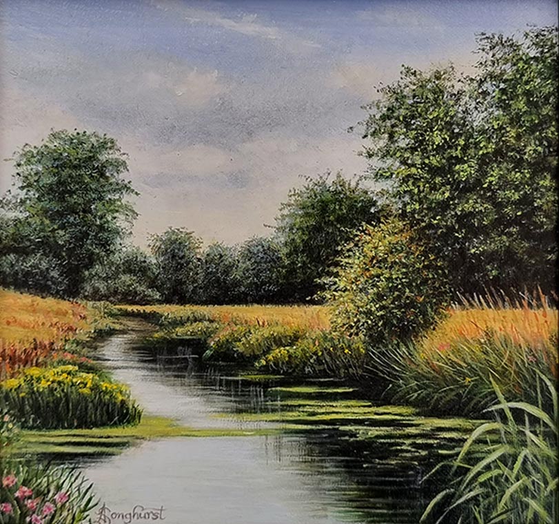 Anne Songhurst Art at Norton Way Gallery Hertfordshire. This beautiful oil painting is an original artwork by British artist Anne Songhurst. It is a landscape and depicts a river in high summer, with reeds and trees. It is framed in a dark wooden frame with a gold slip.