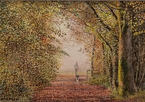 Rosalind Pierson art at Norton Way Gallery Hertfordshire. This beautiful, miniature, painting has been painted in watercolour. It is an original artwork from British artist Rosalind Pierson and depicts a person walking their dog in a woodland scene in autumn. It is framed in a gold frame.