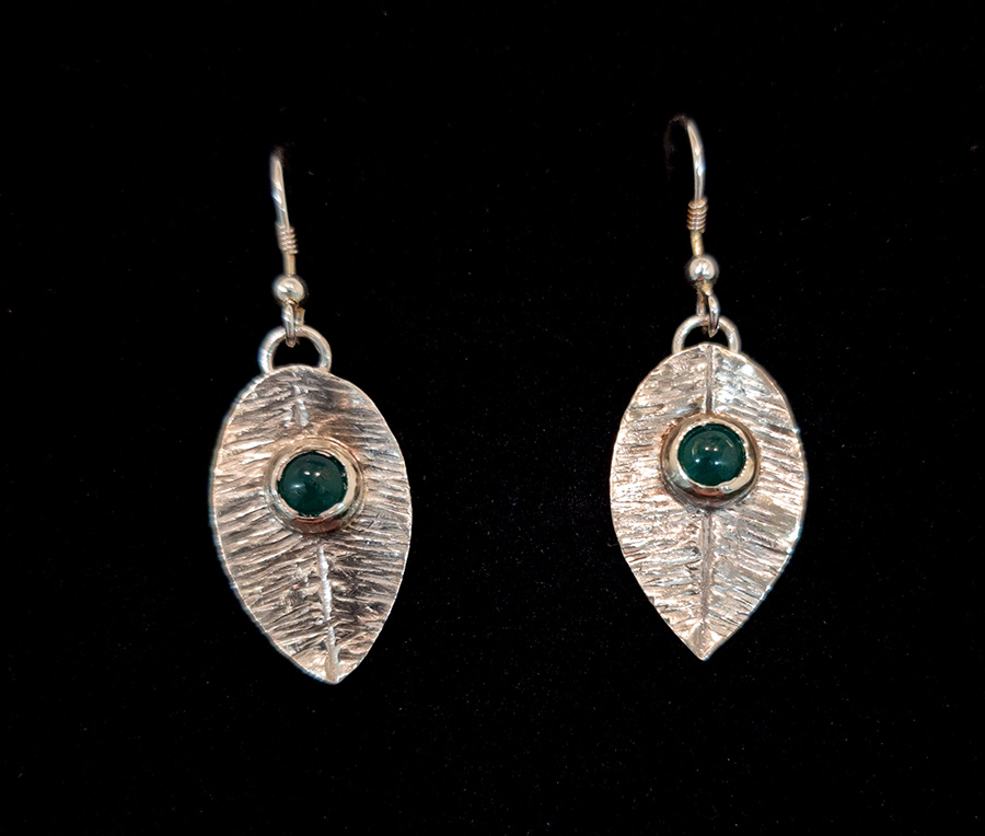 Rob Barnes at Norton Way Gallery Hertfordshire. Rob Barnes Stirling Silver jewelery. Silver Leaf designs with green Agate Stones.