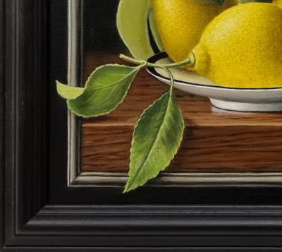 Anne Songhurst Art at Norton Way Gallery Hertfordshire. This beautiful oil painting is an original artwork by British artist Anne Songhurst. It is a still life painting, depicting lemons with a clear glass water jug and pewtor knife. Both the knife and lemons are partly painted in a tromp l'oeil style.
