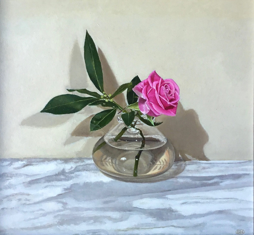 Sian Hopkinson at Norton Way Gallery, Hertfordshire. This original artwork by British artist, Sian Hopkinson is painted in oils. It depicts a snlge stemmed pink rose with a stem of Laurel.