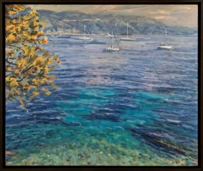 Justin Tew at Norton Way Gallery, Hertfordshire. This original artwork by British artist, Justin Tew is painted in oils. It depicts a coastal scene, looking across a Mediterranean bay.