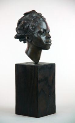 Andrzej Szymczyk bronze sculpture at Norton Way Gallery Hertfordshire. This beautiful African portrait, bronze sculpture is created in foundry bronze by artist Andrzej Szymczyk. It depicts a beautiful female headin a traditional bronze patina.
