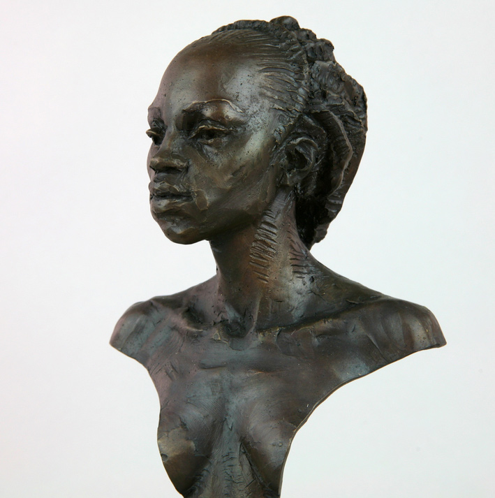 Andrzej Szymczyk bronze sculpture at Norton Way Gallery Hertfordshire. This beautiful African portrait, bronze sculpture is created in foundry bronze by artist Andrzej Szymczyk. It depicts a beautiful Women Warrior of Kau bust, on a bronze pedestal, in a traditional bronze patina.