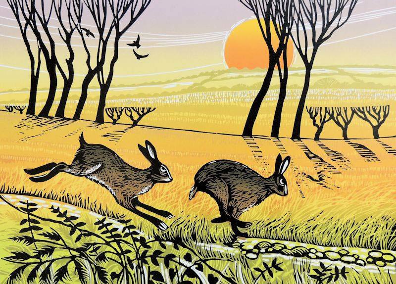 Rob Barnes. This Rob Barnes Linocut depicts two hares in a chase. The landscape is of fields, trees and a sunset.