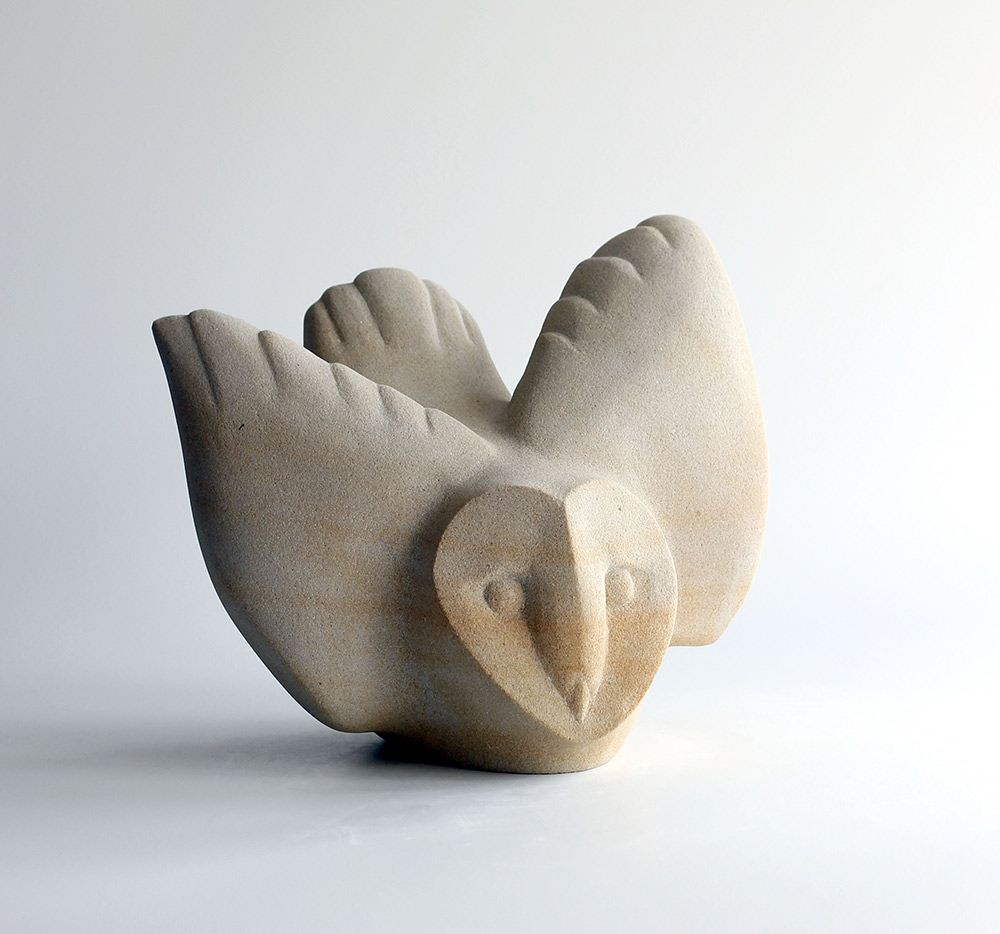 Jennifer Tetlow: This original stone carving by Jennifer Tetlow is an original work of art, it is original, elegant and beautiful. It depicts a a swooping young Barn Owl bird. It is a Jennifer Tetlow original stone carving in Hazeldean Sandstone.