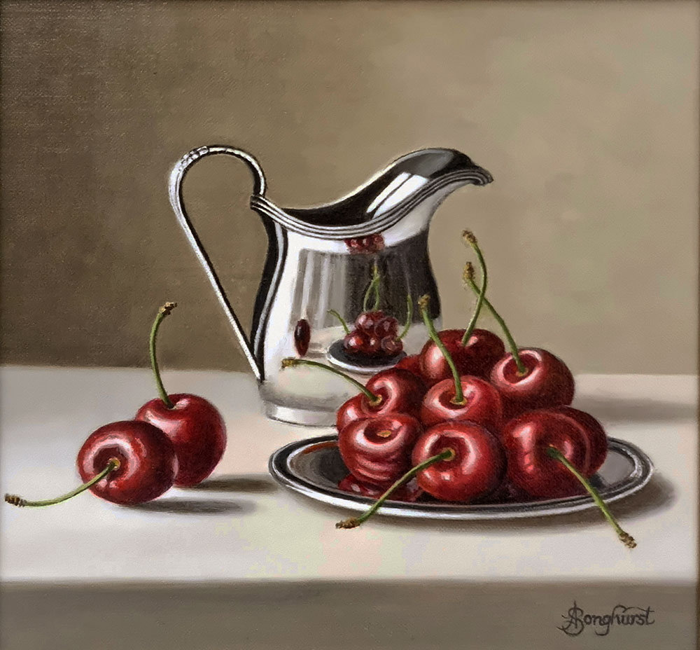 Anne Songhurst Art at Norton Way Gallery Hertfordshire. This beautiful oil painting is an original artwork by British artist Anne Songhurst. It is a still life painting, depicting a silver dish of dark red cherries, with a silver jug. It is framed in a dark wood frame.